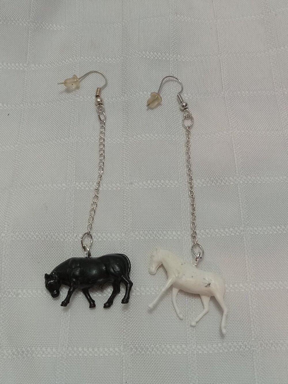 Handmade earrings with vintage plastic horses toys